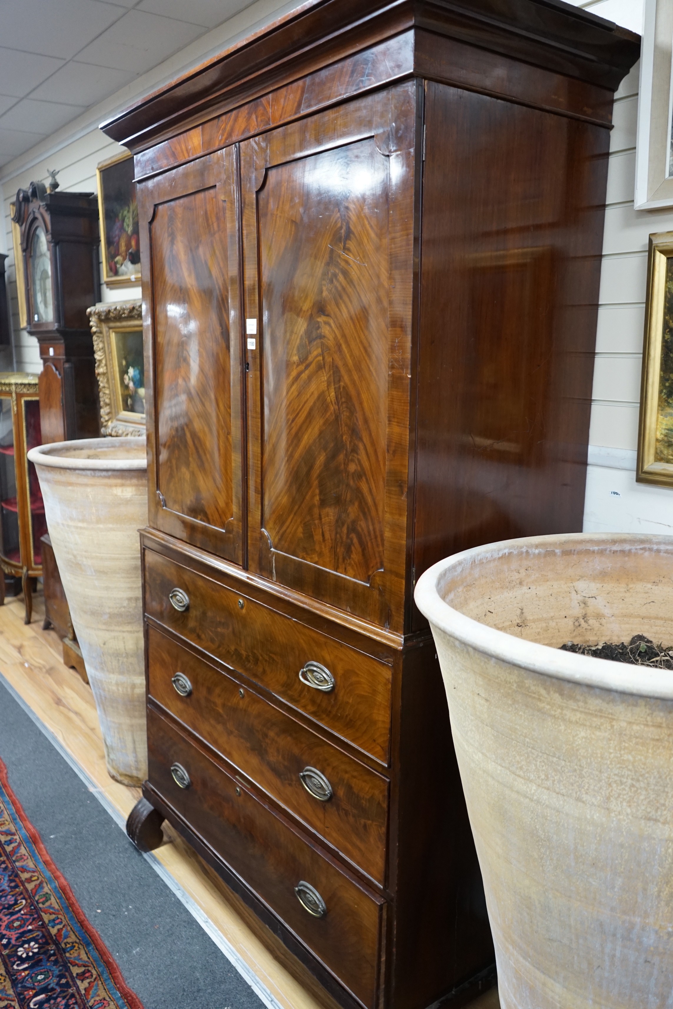 A George IV mahogany linen press, width 126cm, depth 62cm, height 213cm